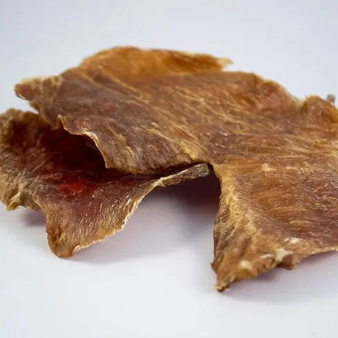 Natural beef jerky pieces, perfect for a protein-packed snack or dog treat.