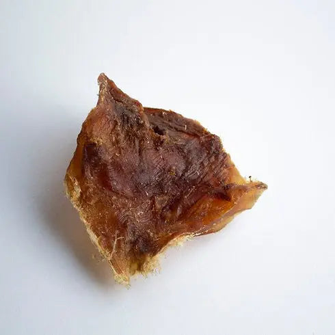 Natural beef jerky piece, rich in flavor and perfect for a protein-packed snack.