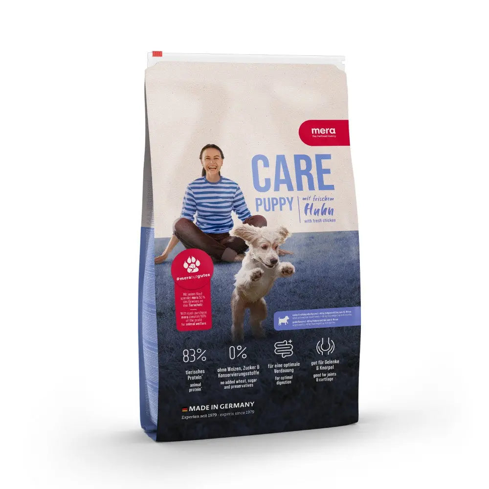 Puppy food bag featuring a happy dog and owner, highlighting ingredients and care for young pets.