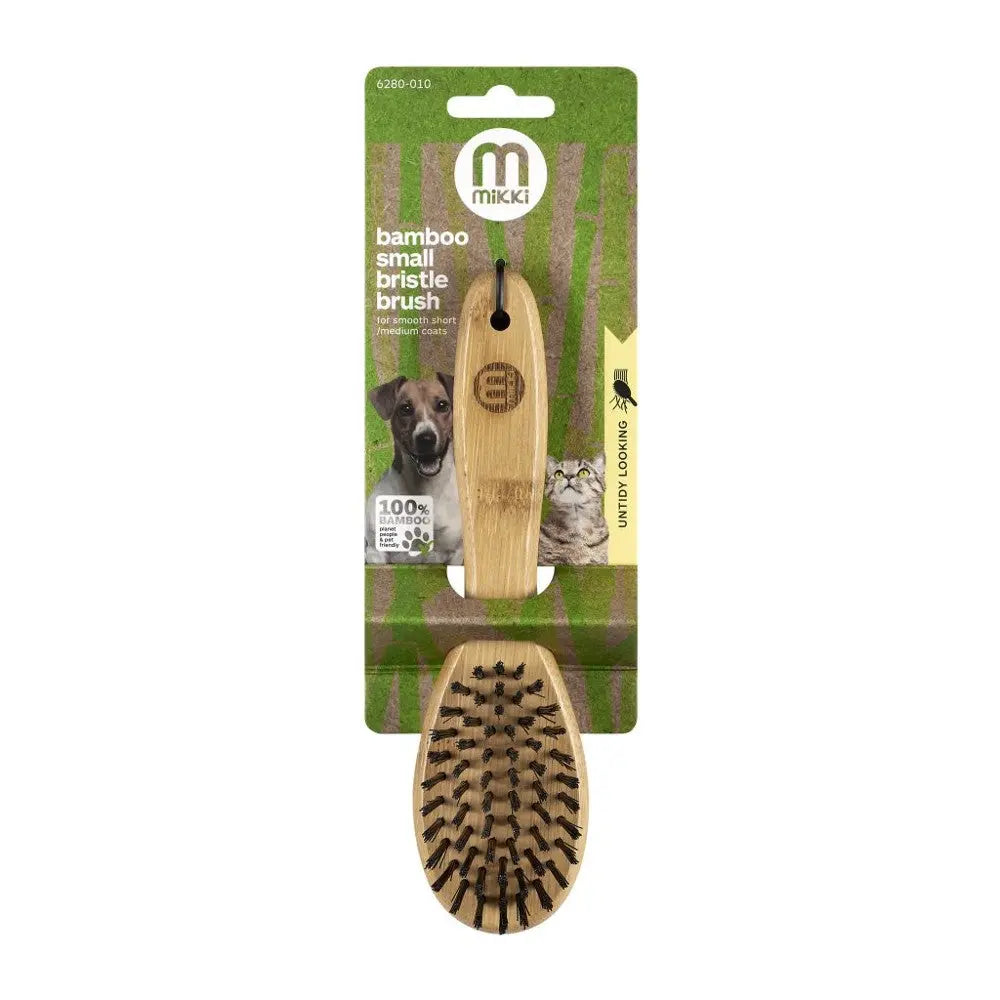 Bamboo small bristle brush for dogs, eco-friendly grooming tool with a comfortable handle.