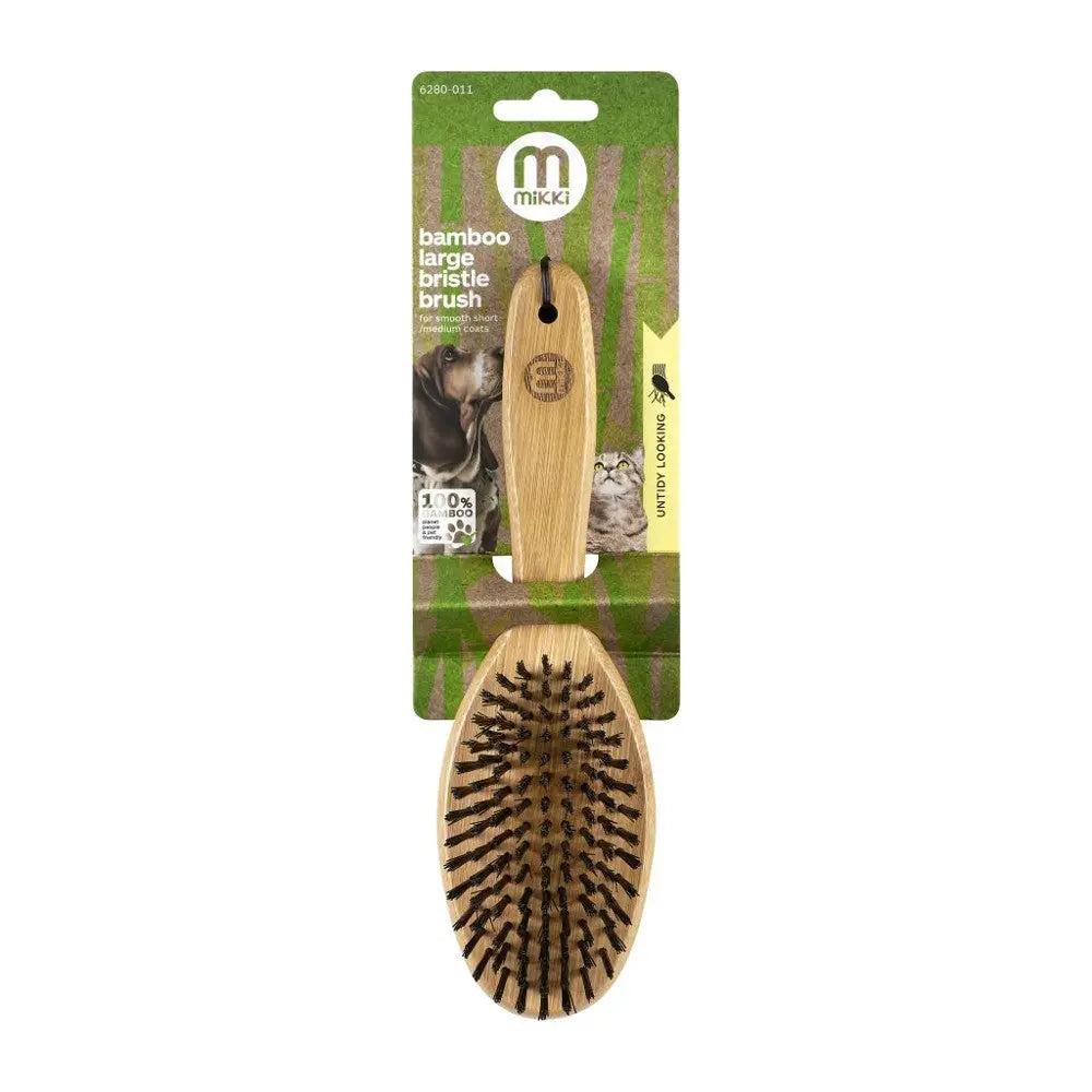 Bamboo large bristle brush for pets, eco-friendly grooming tool with ergonomic handle.