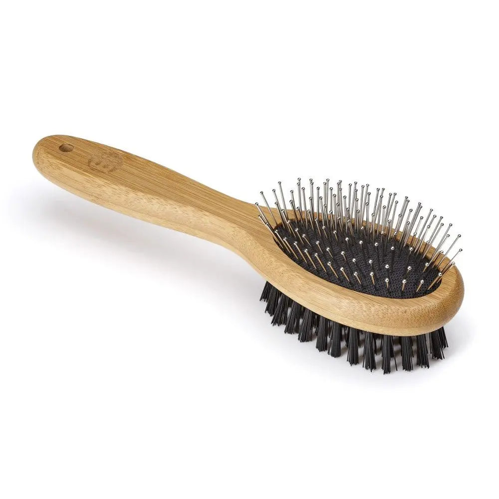 Bamboo pet brush with metal pins for effective grooming and detangling fur.