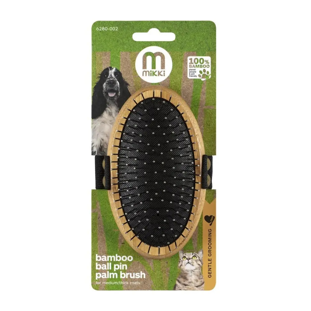 Bamboo ball pin palm brush for gentle grooming of medium to thick pet coats.