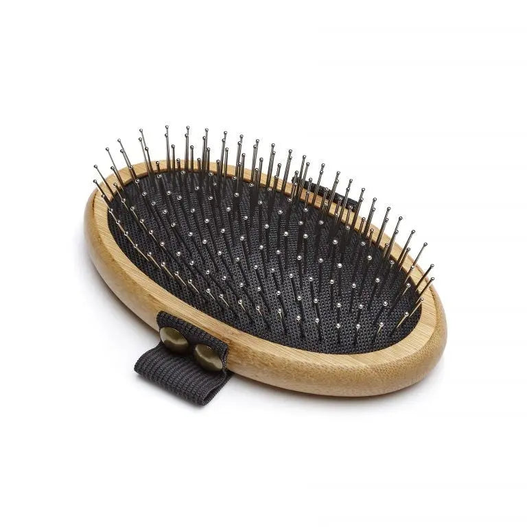 Bamboo hairbrush with metal bristles for gentle detangling and styling.