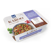 Premium dog food packaging featuring slow-cooked duck, vegetables, and a balanced diet for all breeds.