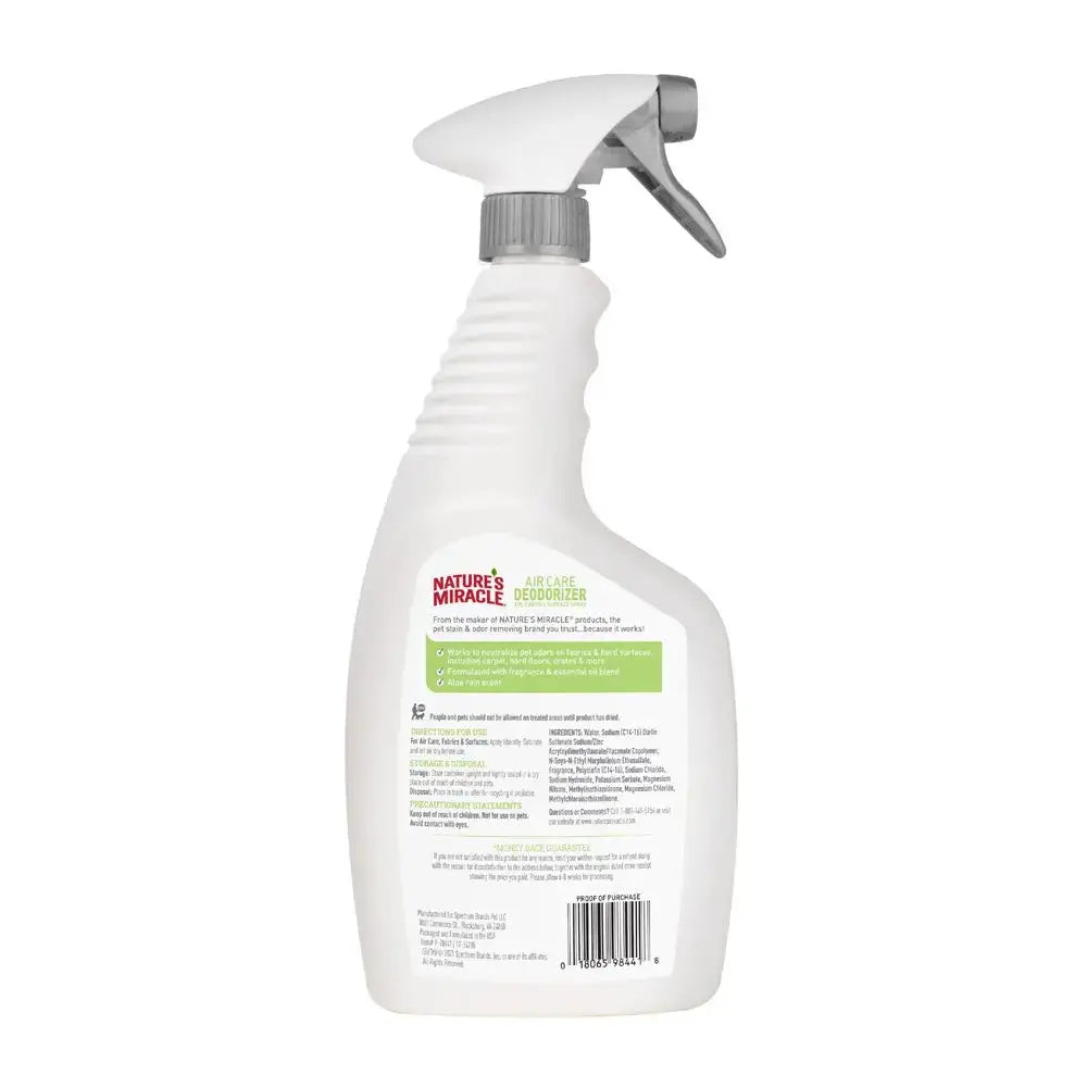 Nature's Miracle pet odor eliminator spray bottle with clear label and easy-to-use nozzle for effective cleaning.