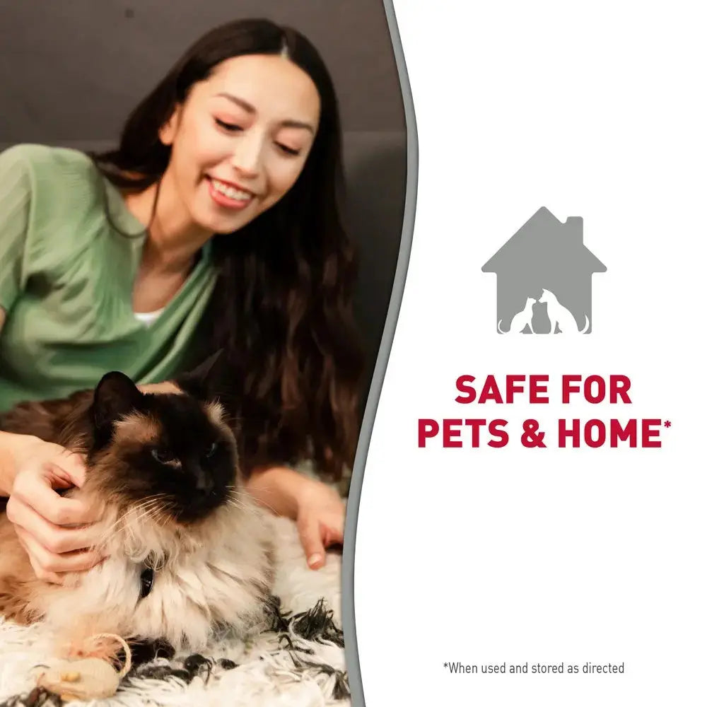 Woman enjoying time with a cat, highlighting pet safety and comfort at home.