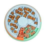 Interactive pet feeding bowl with divided sections for dry and wet food.