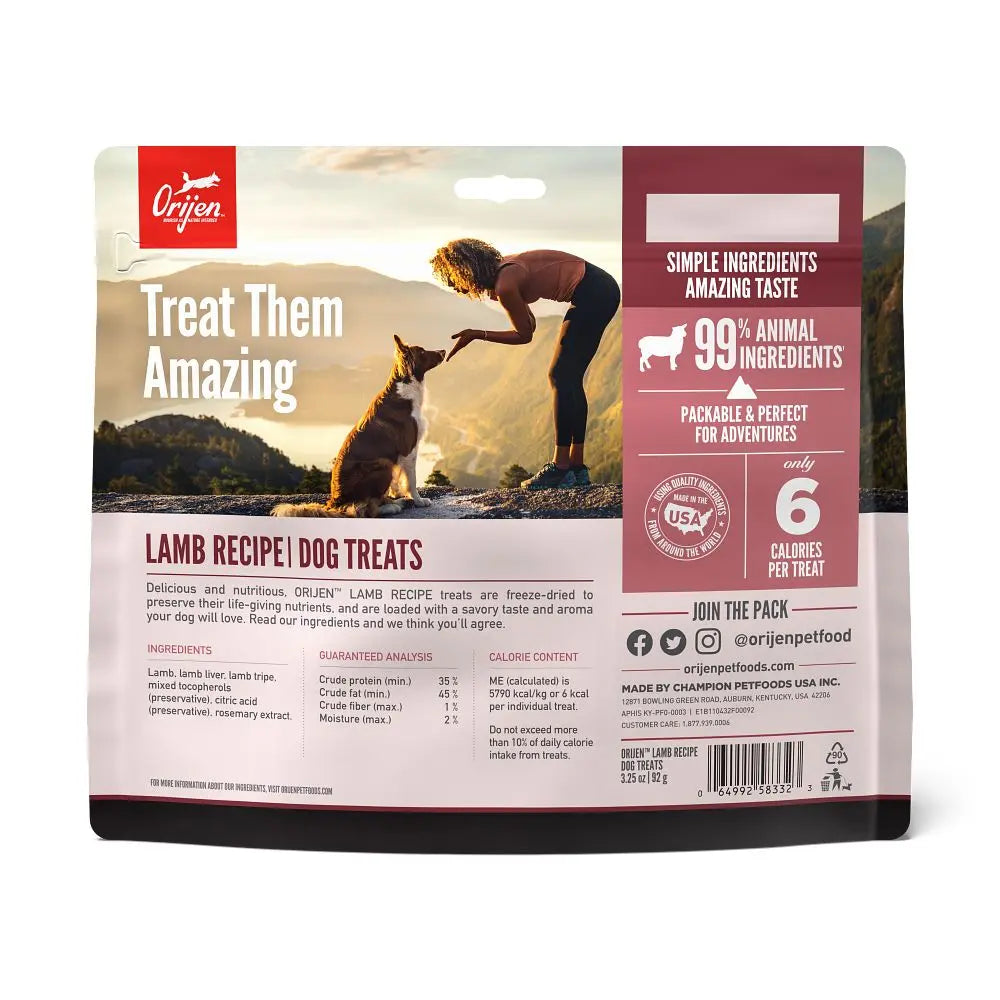 Orijen Lamb Recipe Dog Treats packaging featuring a dog and owner in a scenic outdoor setting.