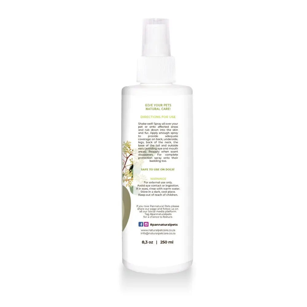 Natural pet care spray with usage directions and safety information on a white bottle.