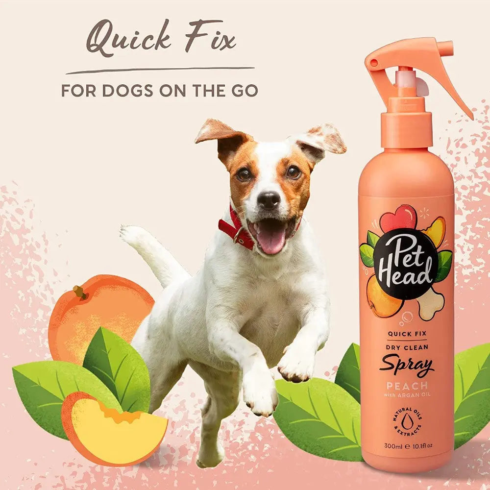 Pet Head Quick Fix dry clean spray for dogs, featuring a peach scent and a playful dog illustration.
