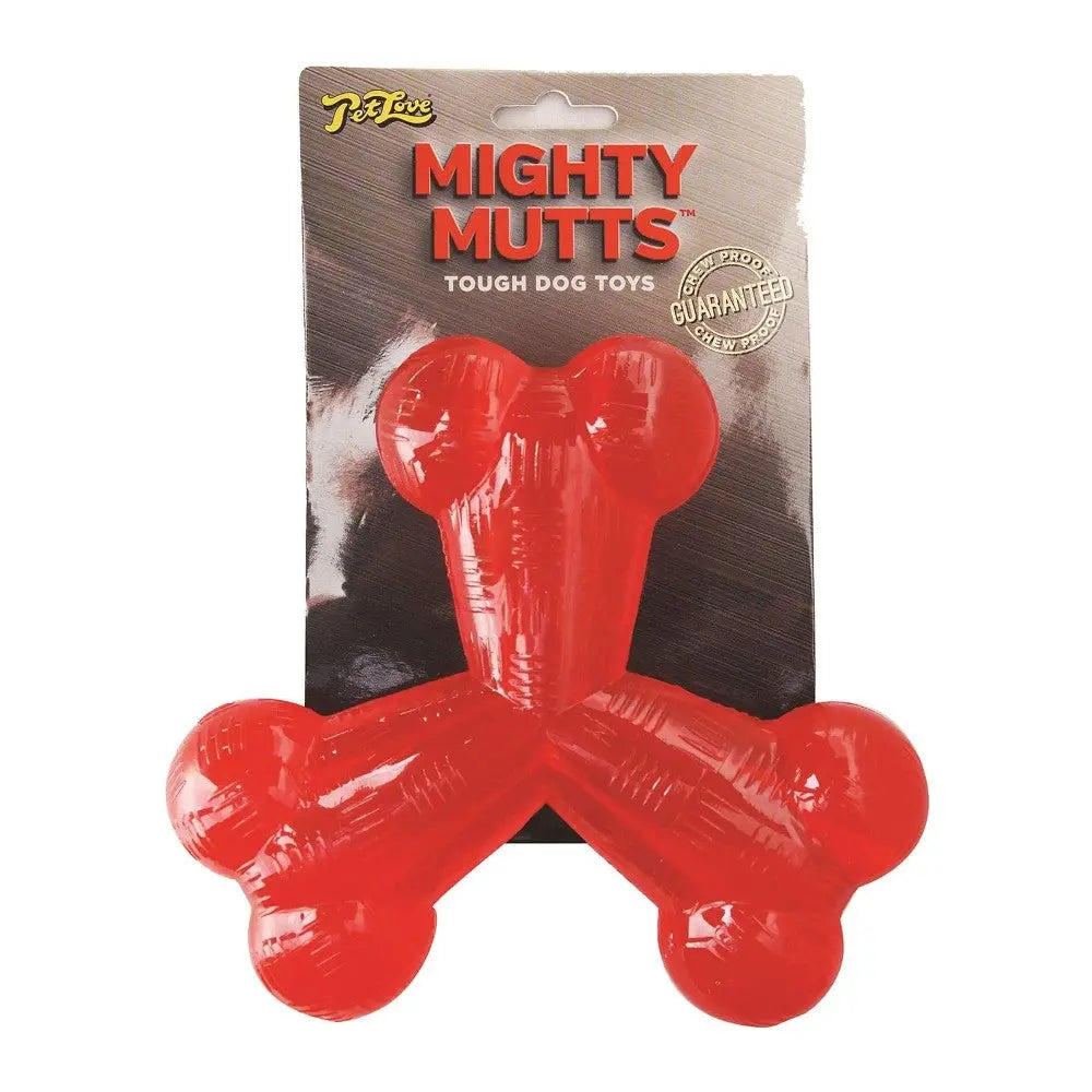 Red dog toy in a bone shape, designed for tough chewers, packaged for pet store display.