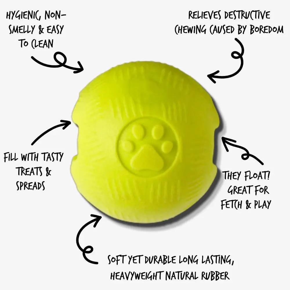 Durable yellow dog toy made of natural rubber, designed for fetch and treat dispensing.