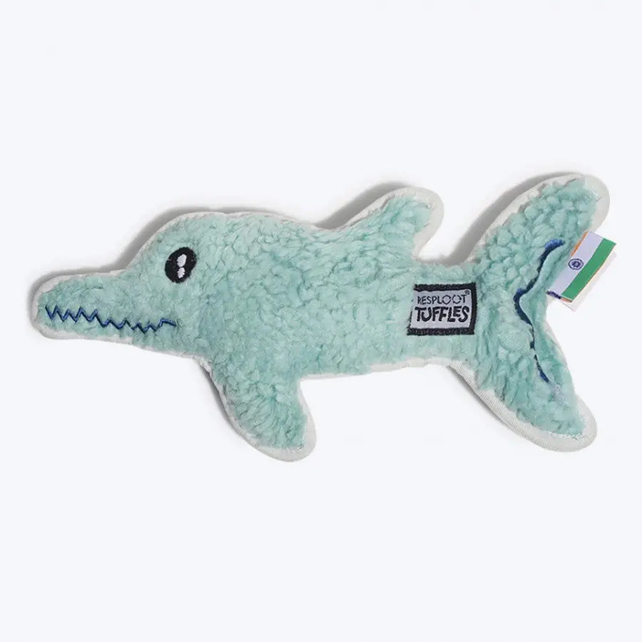 Soft plush dolphin toy for dogs, perfect for cuddling and playtime.
