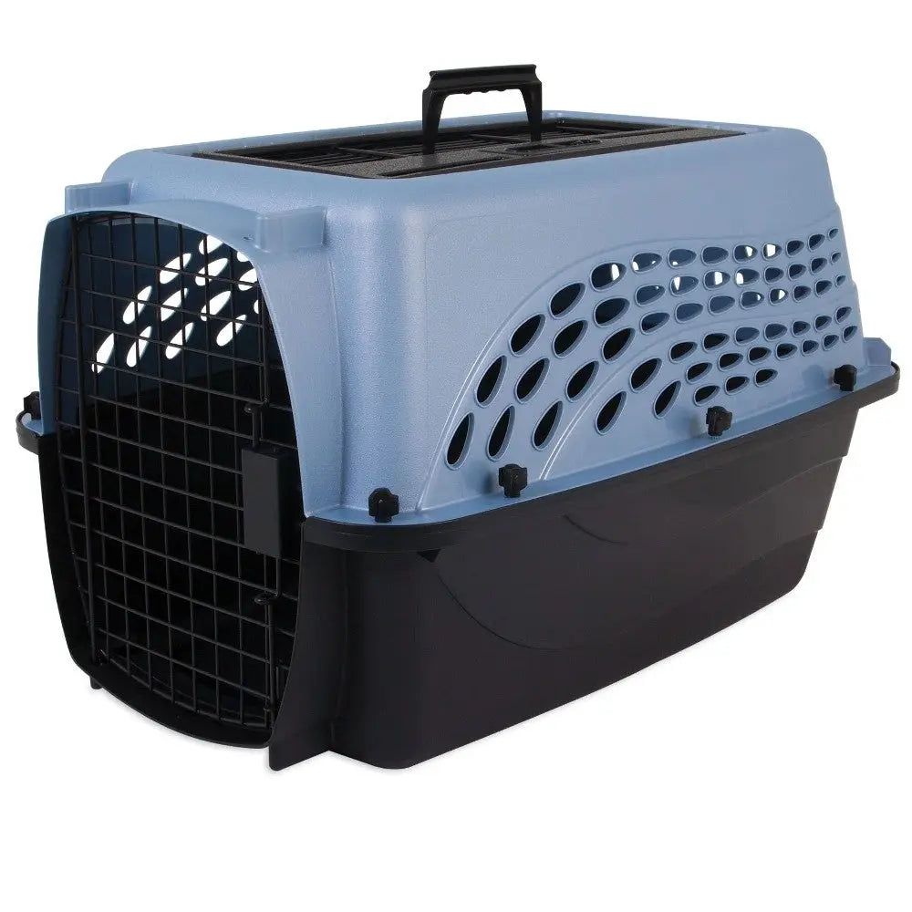 Pet carrier, durable design, ventilation holes, secure door, ideal for travel with cats or small dogs.