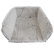 Cozy, plush pet bed with soft, fluffy interior for ultimate comfort and relaxation.