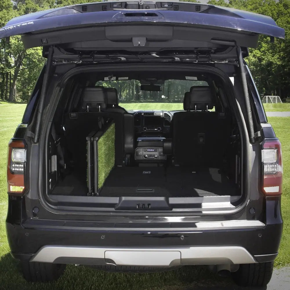 Spacious SUV trunk with a foldable seat, perfect for outdoor adventures and transporting gear.