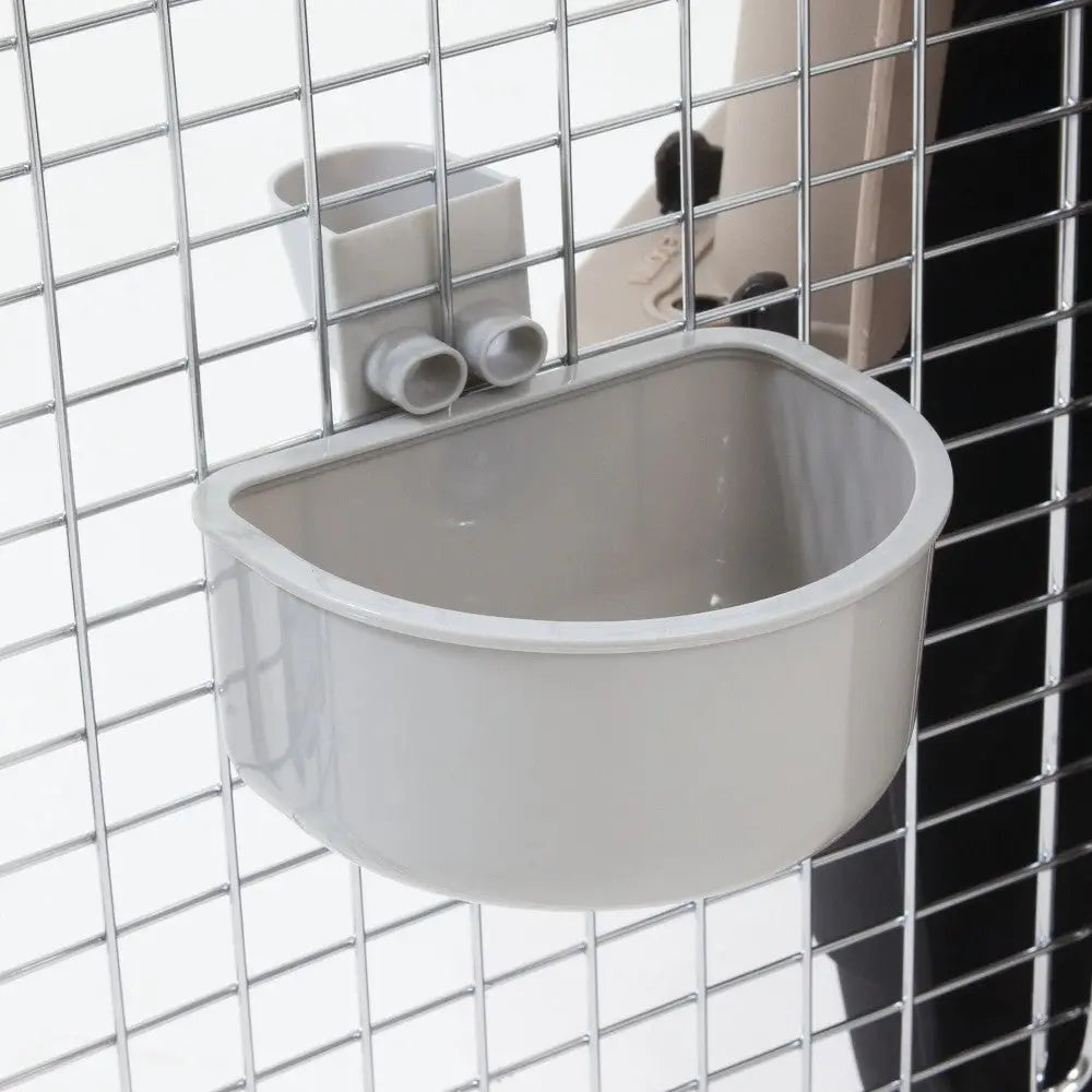 Pet water bowl attachment for wire crates, designed for easy access and secure fitting.
