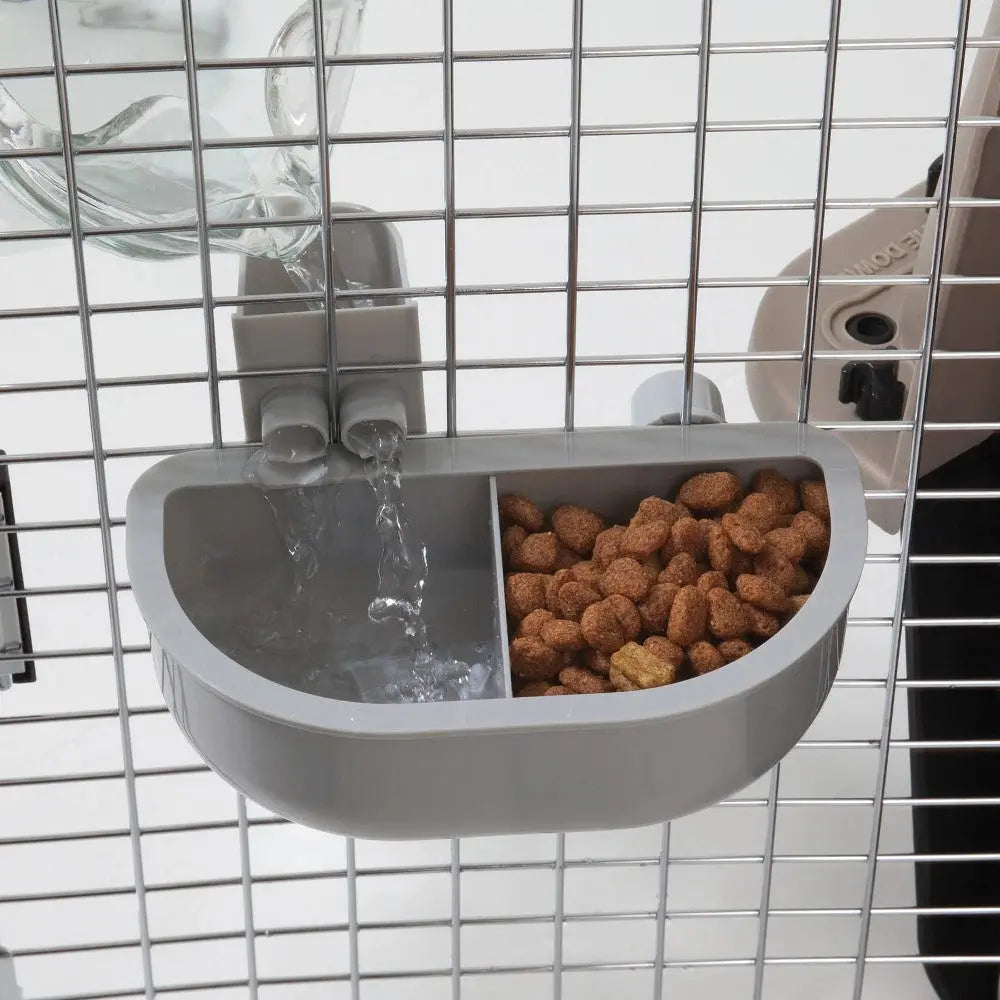 Pet feeding station with water dispenser and dry food compartment for convenient pet care.