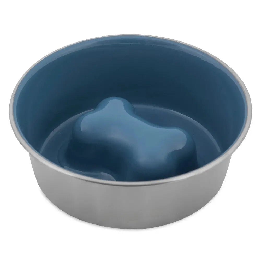 Stainless steel dog bowl with a bone-shaped silicone insert for easy feeding.