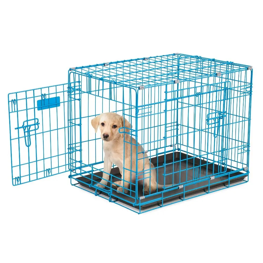 Blue dog crate with a puppy sitting inside, featuring a removable plastic tray for easy cleaning.