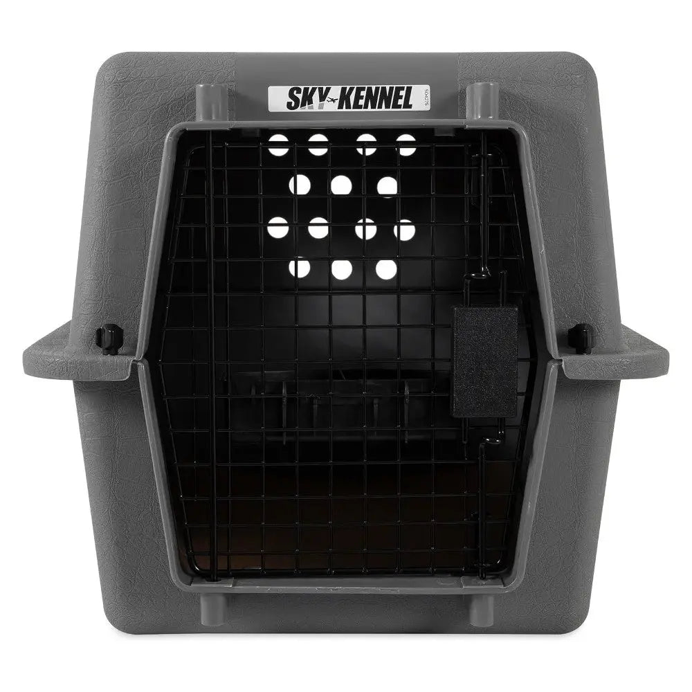 Durable pet carrier with a secure metal door for safe travel and transport of dogs and cats.