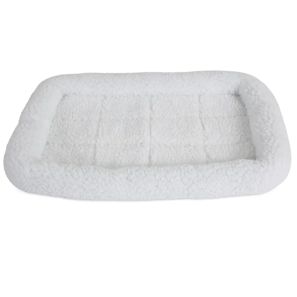 Cozy white pet bed with soft, plush fabric for ultimate comfort and relaxation.