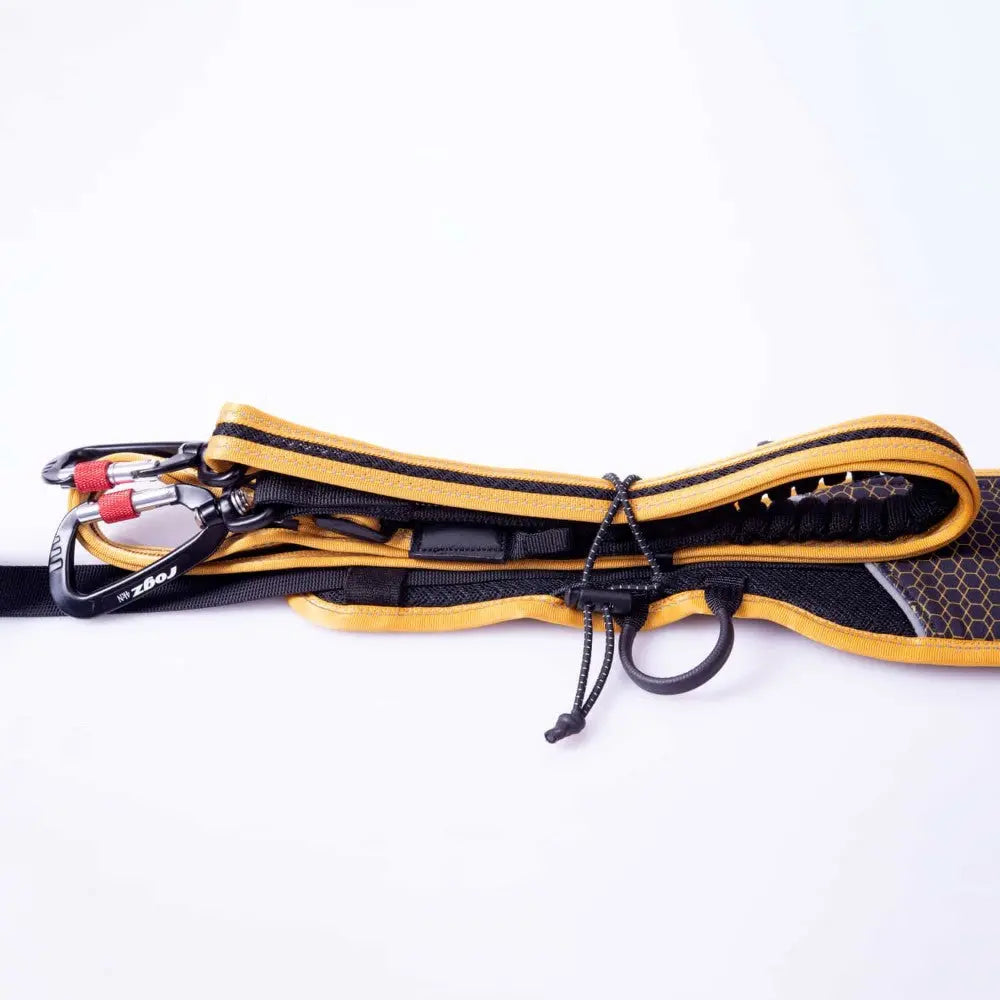 Durable climbing harness with carabiner and adjustable straps for safety and comfort.