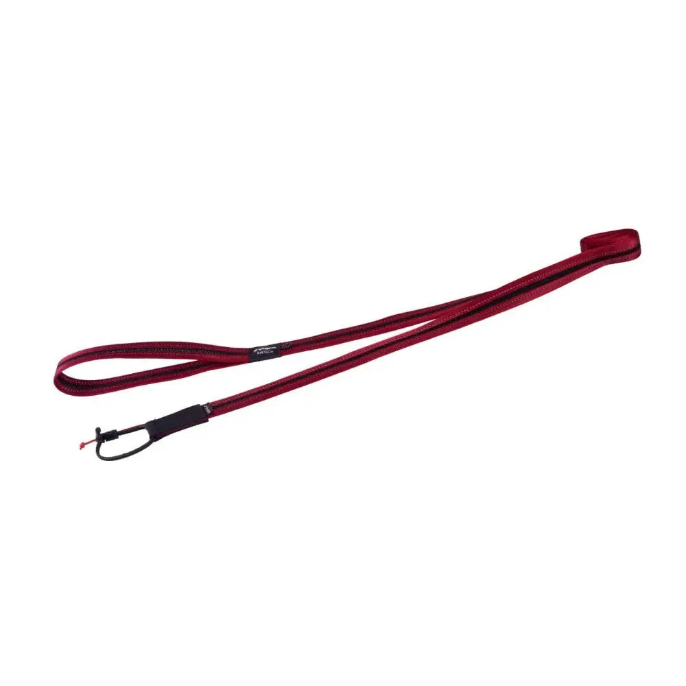 Durable red dog leash with a comfortable grip and secure clip for safe walks.