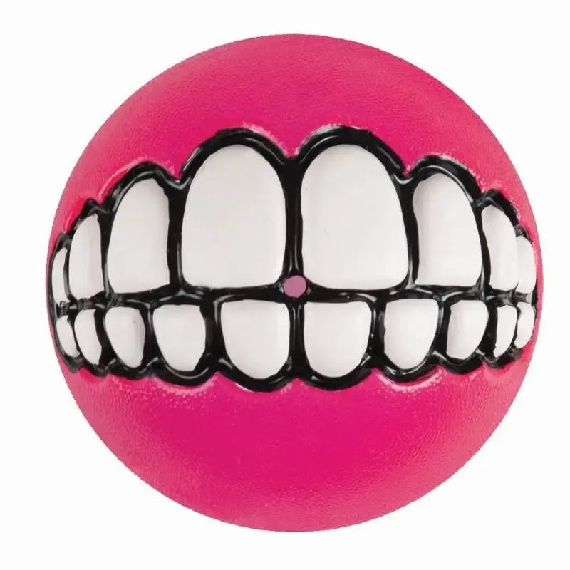 Pink rubber ball with a playful teeth design, perfect for pet playtime and fun.
