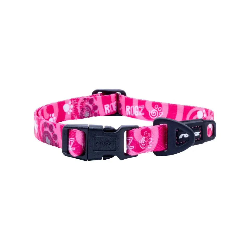 Pink pet collar with playful patterns and adjustable buckle for comfort and style.