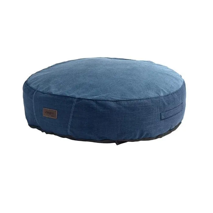 Round blue pet bed with a soft fabric cover for comfortable lounging.