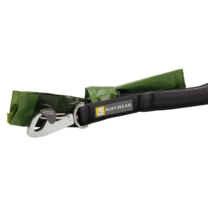 Ruffwear dog leash with integrated waste bag holder for convenient pet clean-up.