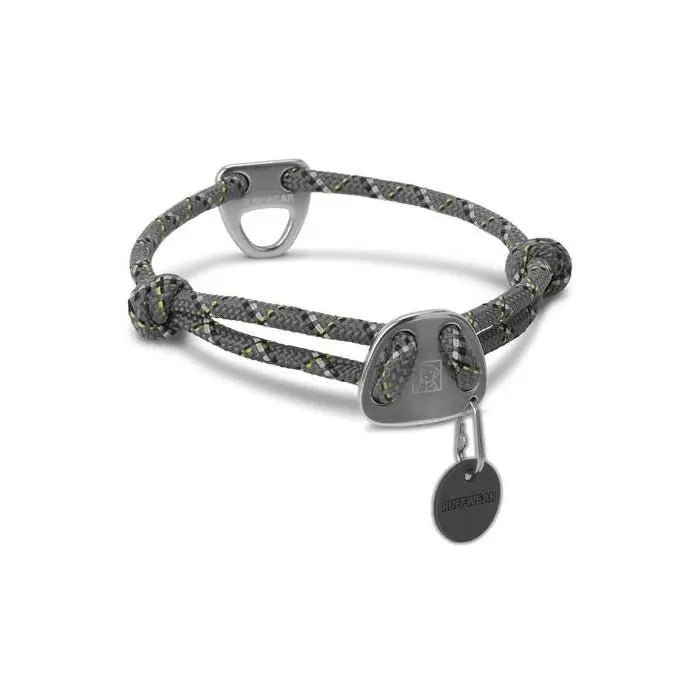 Stylish gray rope bracelet with metal accents and a charm for a modern accessory look.