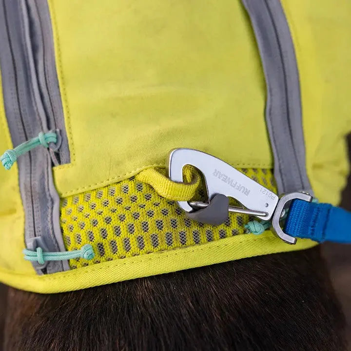 Durable dog harness attachment point with secure clip and bright yellow design for visibility.