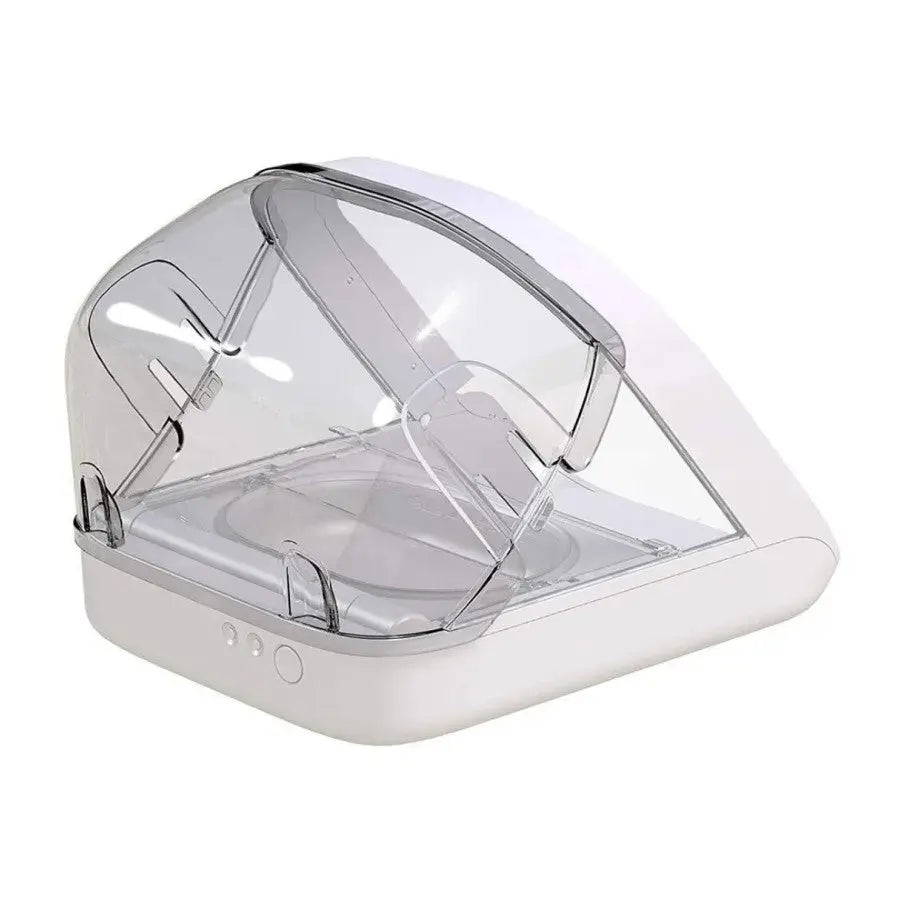 Automatic pet feeder with transparent lid for easy access and monitoring.