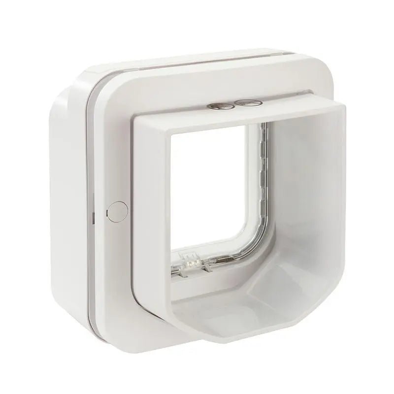 White pet door with a clear flap for easy access and secure entry for pets.
