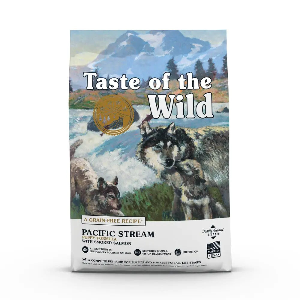 Taste of the Wild Pacific Stream puppy food bag featuring smoked salmon and a scenic mountain background.