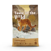 Taste of the Wild Canyon River cat food bag featuring salmon, grain-free recipe, and mountain lion illustration.