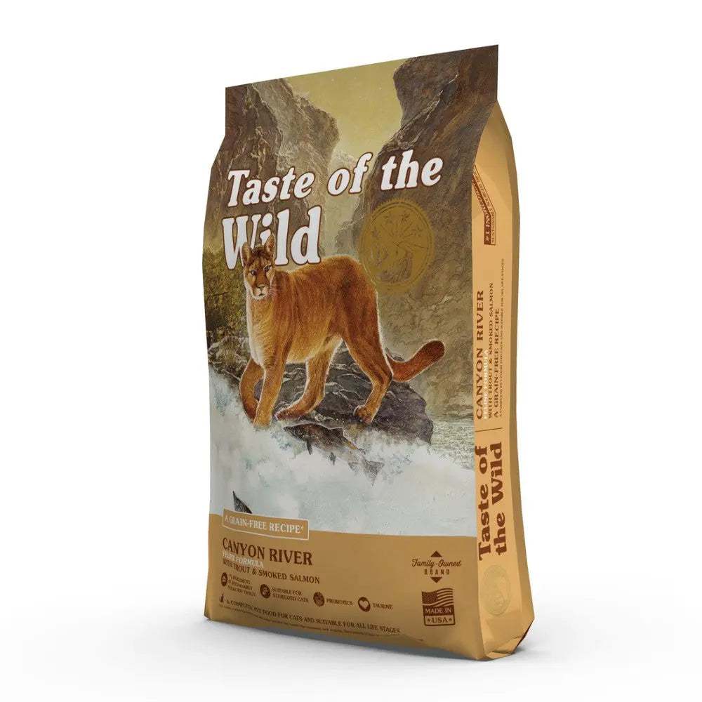 Taste of the Wild Canyon River cat food bag featuring salmon and a mountain lion design.