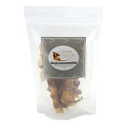 Natural pet treats in a clear bag, featuring healthy ingredients for dogs.