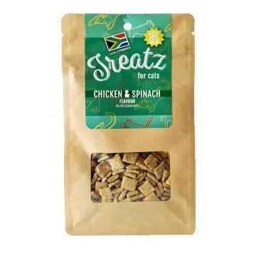 Cat treat bag featuring chicken and spinach flavor, with a clear window showcasing the crunchy bites.