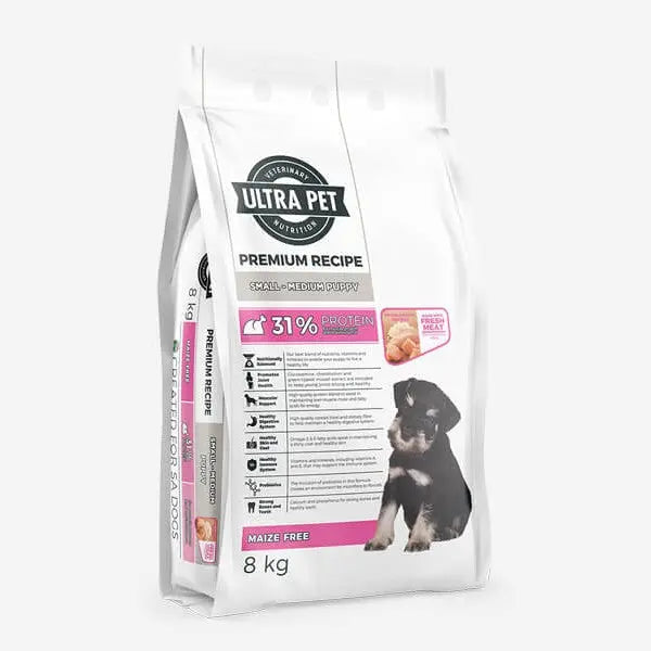 Premium puppy food bag with 31% protein, maize-free formula, and a cute puppy image on the packaging.