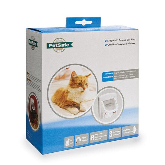 PetSafe Staywell Magnetic 4 Way Locking Deluxe Cat Flap - lifestyle image with pet South Africa ecommerce