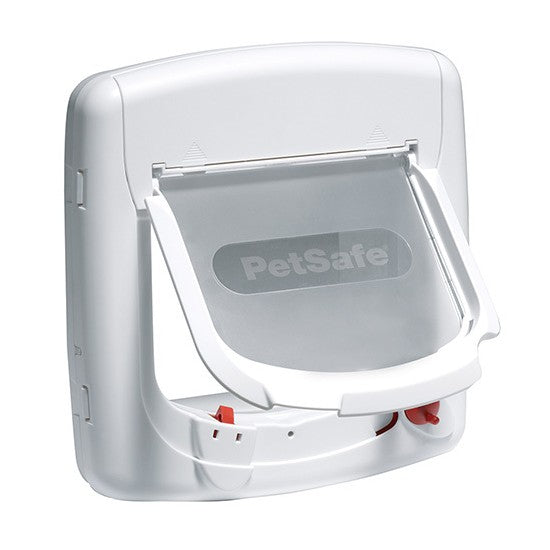 PetSafe Staywell Magnetic 4 Way Locking Deluxe Cat Flap - lifestyle image with pet Canine & Co South Africa