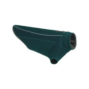 Dog coat in teal color, designed for warmth and comfort during outdoor activities.