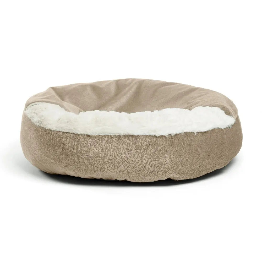 Cozy round pet bed with soft faux fur lining for ultimate comfort and relaxation.