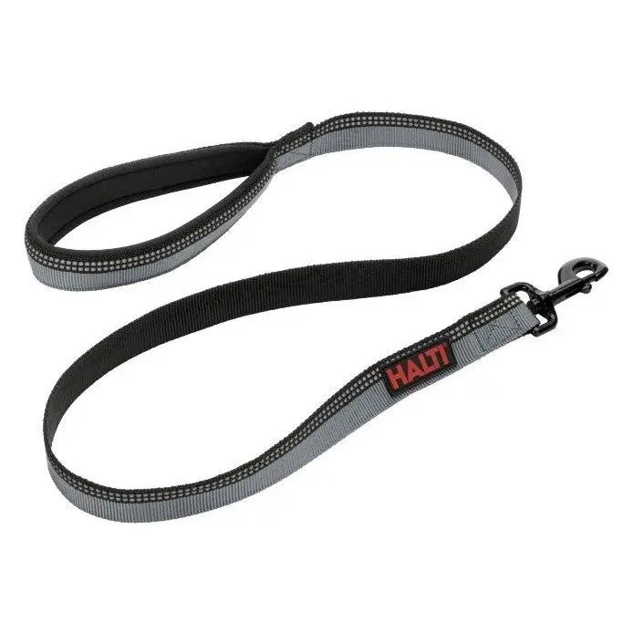 Durable Halti dog leash with reflective stitching for safe nighttime walks.