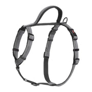 Adjustable dog harness in gray, designed for comfort and safety during walks.