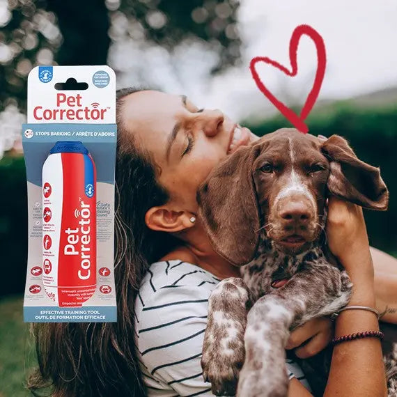 Woman cuddling a dog with a Pet Corrector spray for effective training and behavior correction.